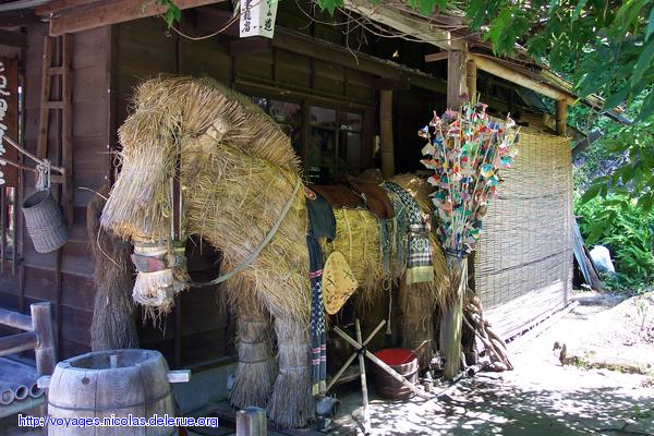Straw horse with ceremonial arrows